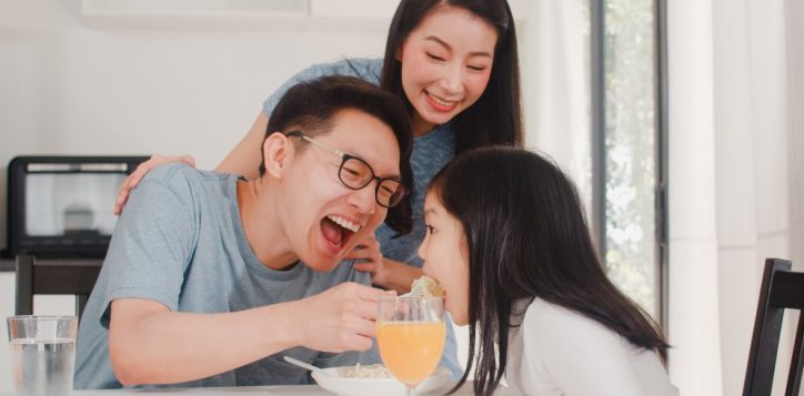 asian-japanese-family-has-breakfast-home-asian-happy-dad-mom-daughter-eat-spaghetti-drink-orange-juice-table-modern-kitchen-house-morning-2